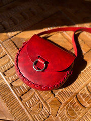 Crimson red leather bag with antique nickel oring