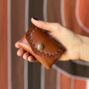 stamped brown snap wallet
